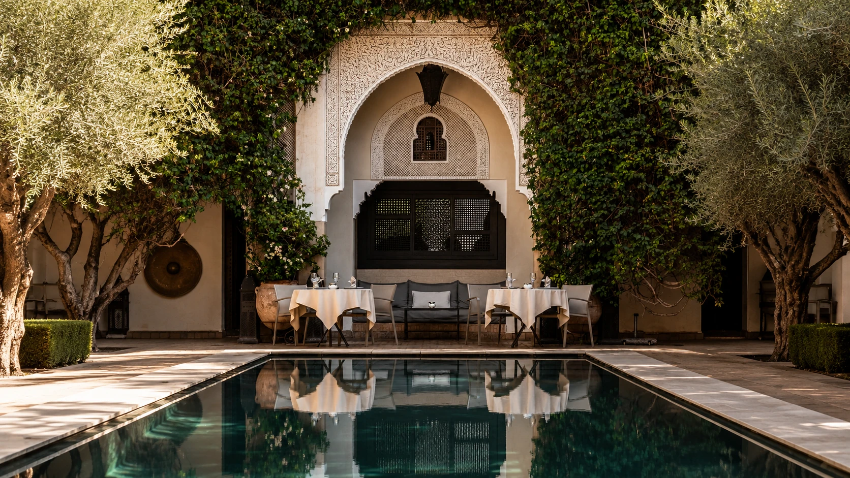 Courtyard and pool surrounded by mature trees